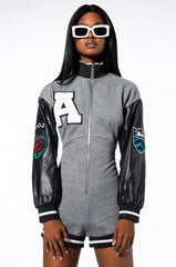 COLLEGIATE TEAM CAPTAIN LONG SLEEVE ZIPPERED MOCK NECK ROMPER